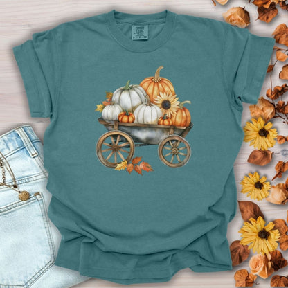 Blue Spruce t-shirt with a watercolor rustic wagon, pumpkins, and sunflowers.