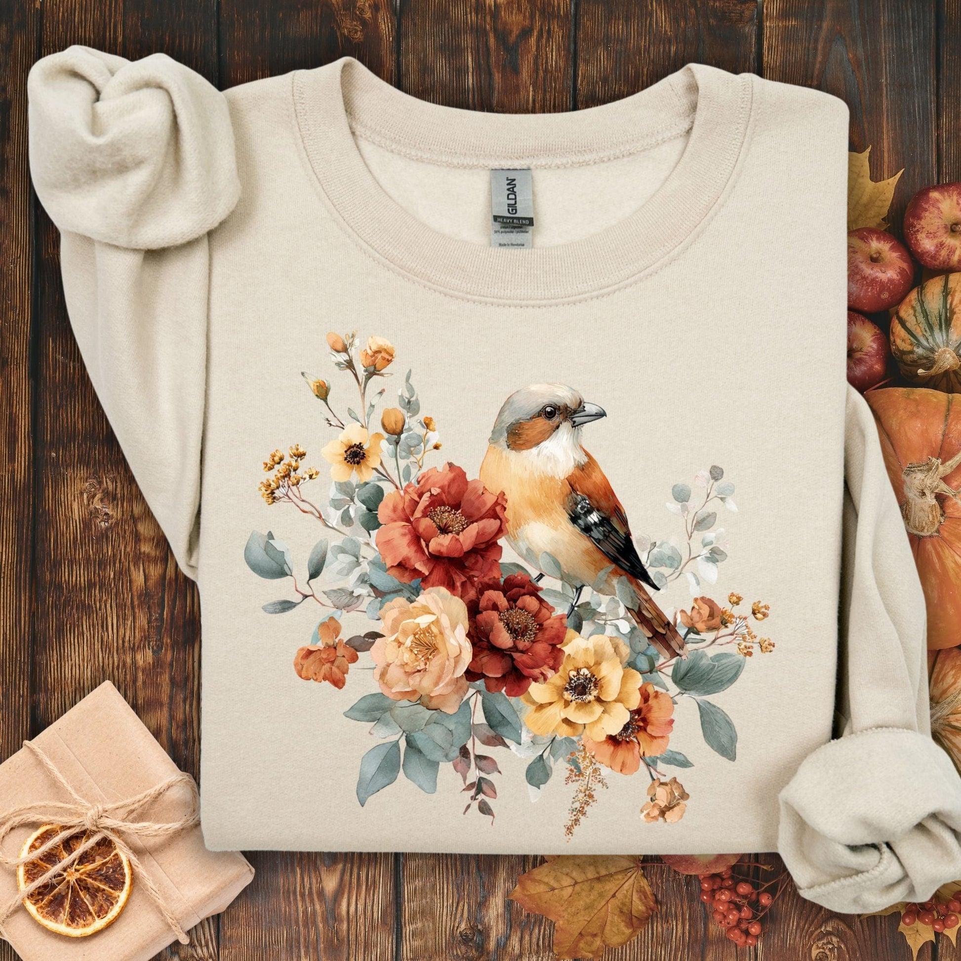 Sand Gildan crewneck sweatshirt with watercolor sparrow and autumn roses design.