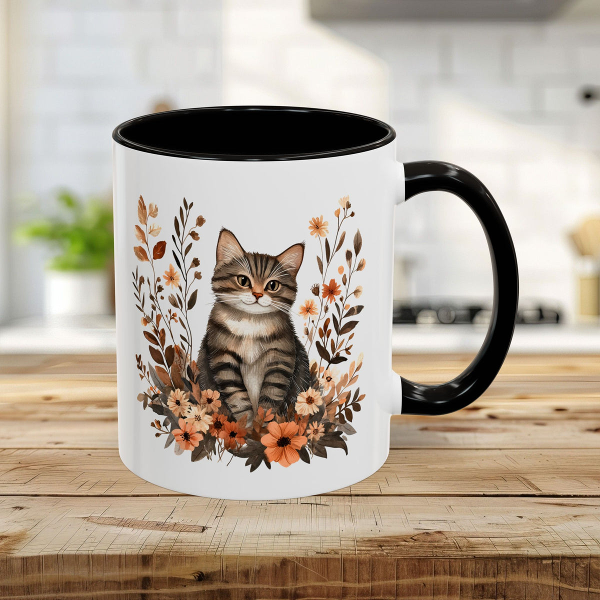 Autumn striped tabby cat mug with burnt orange wildflowers, black handle and interior.