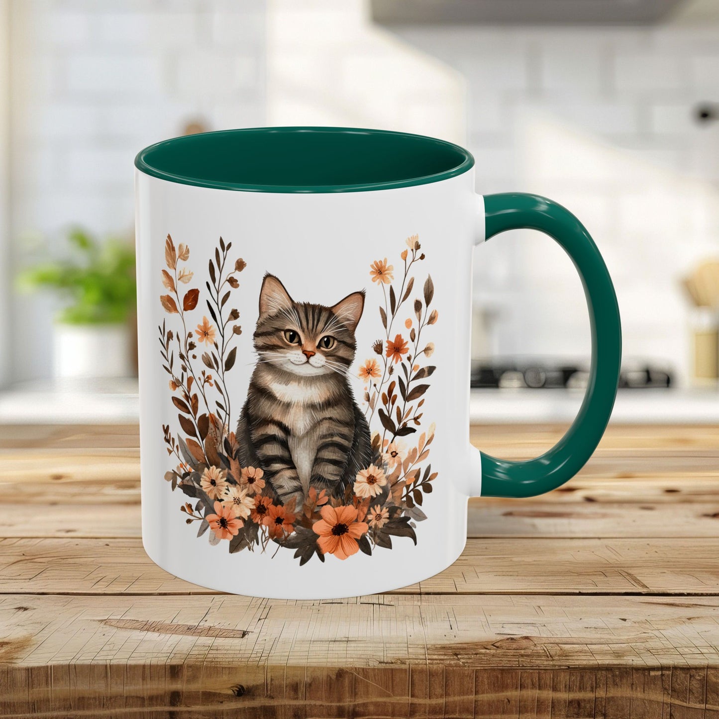 Autumn striped tabby cat mug with burnt orange wildflowers, green handle, and interior.