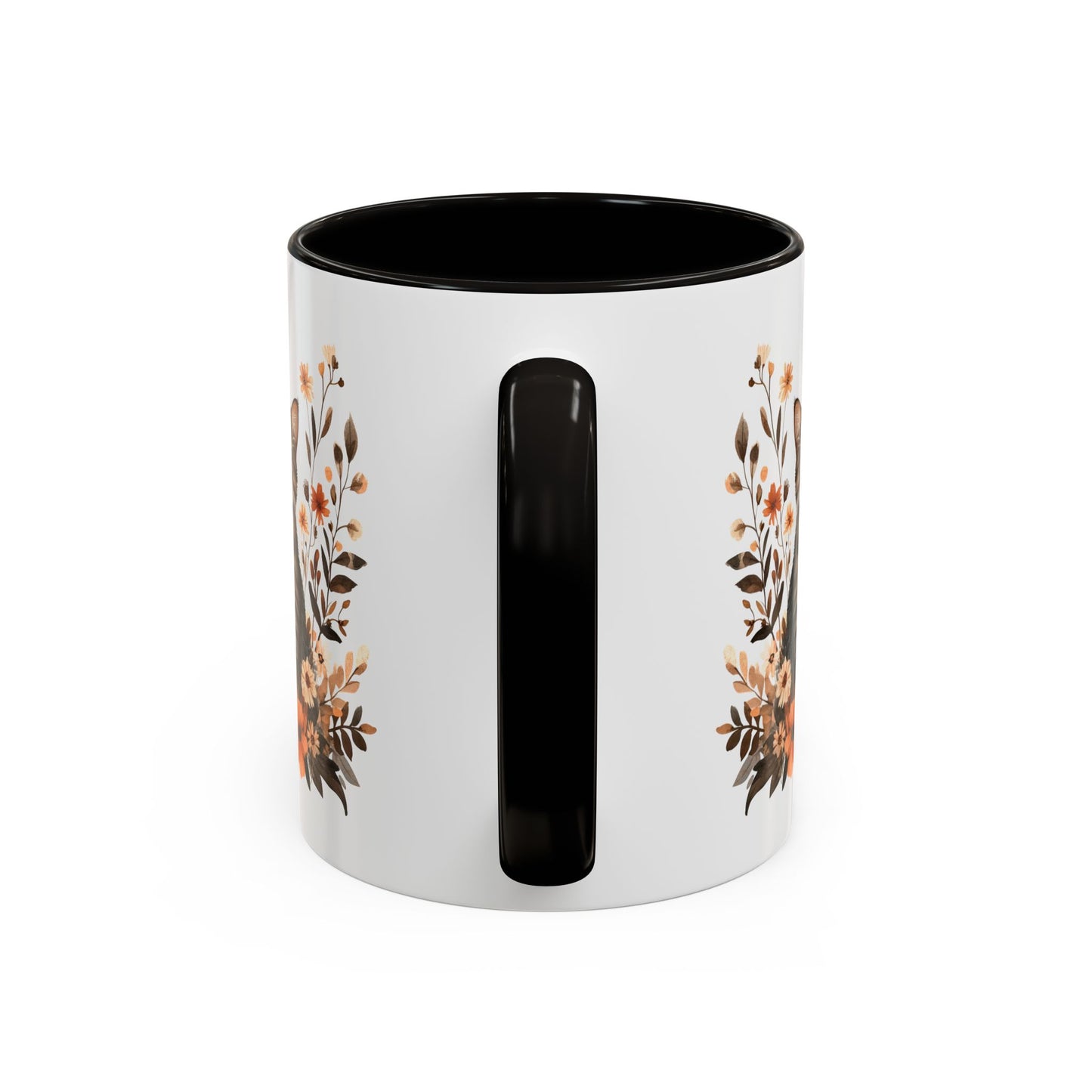 White ceramic mug with black handle and interior, featuring a watercolor autumn floral design.