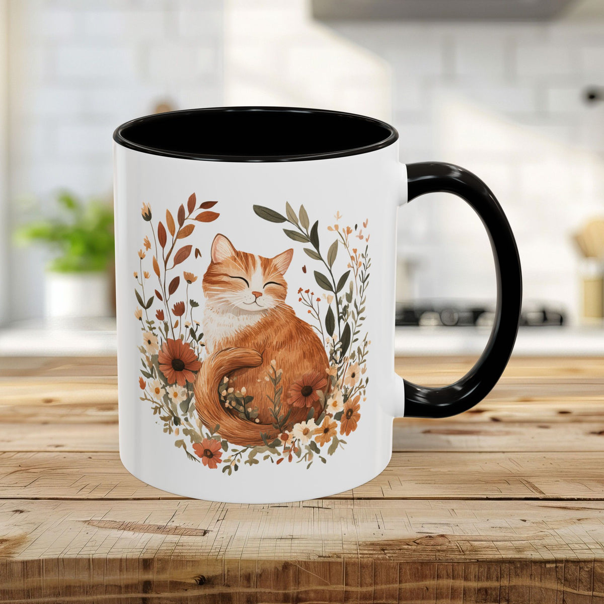 11oz white ceramic mug with black interior/handle, featuring a ginger cat among autumn wildflowers.