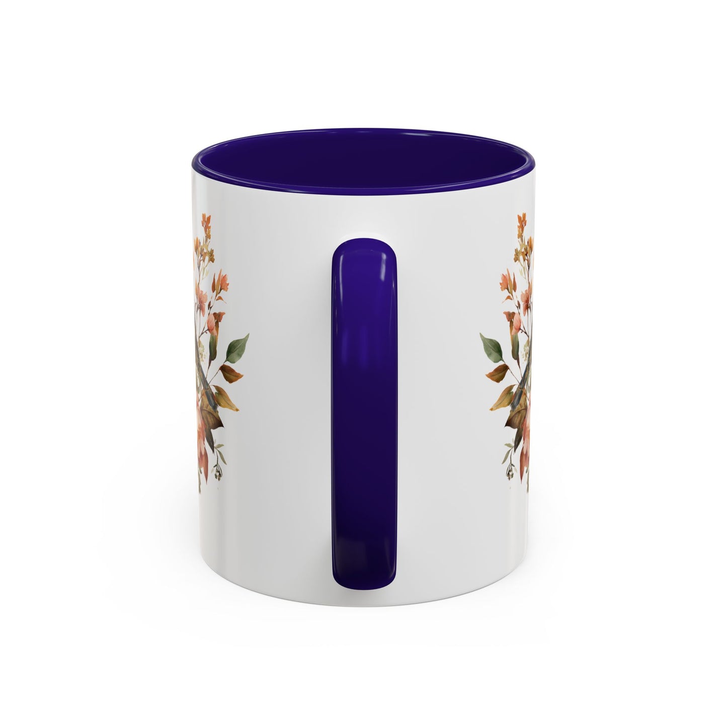 White ceramic mug with a dark blue interior and handle, featuring a watercolor autumn floral design.