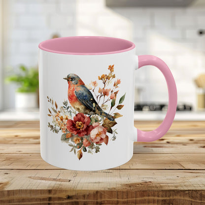 11oz white ceramic mug with pink interior/handle, featuring a watercolor bluebird and peony design.