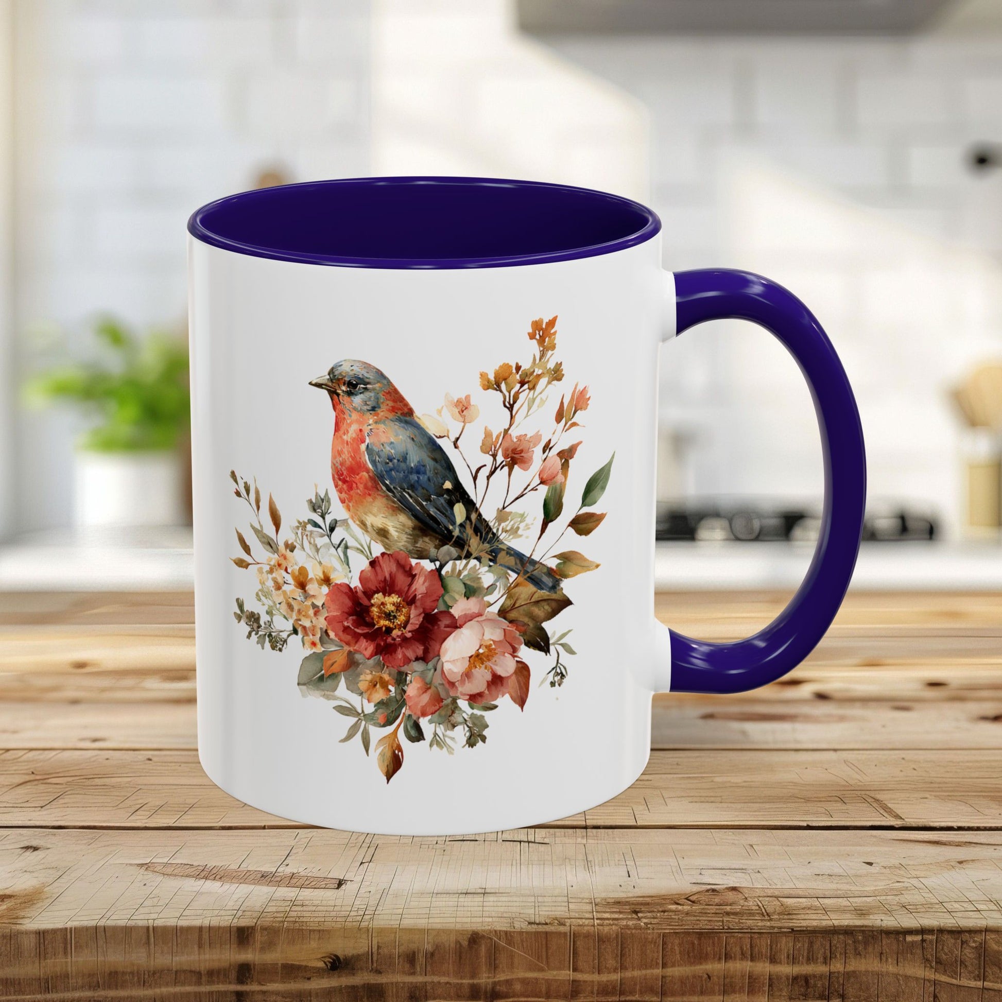 11oz glossy ceramic mug with a blue interior and handle, featuring a watercolor bluebird and peony design.