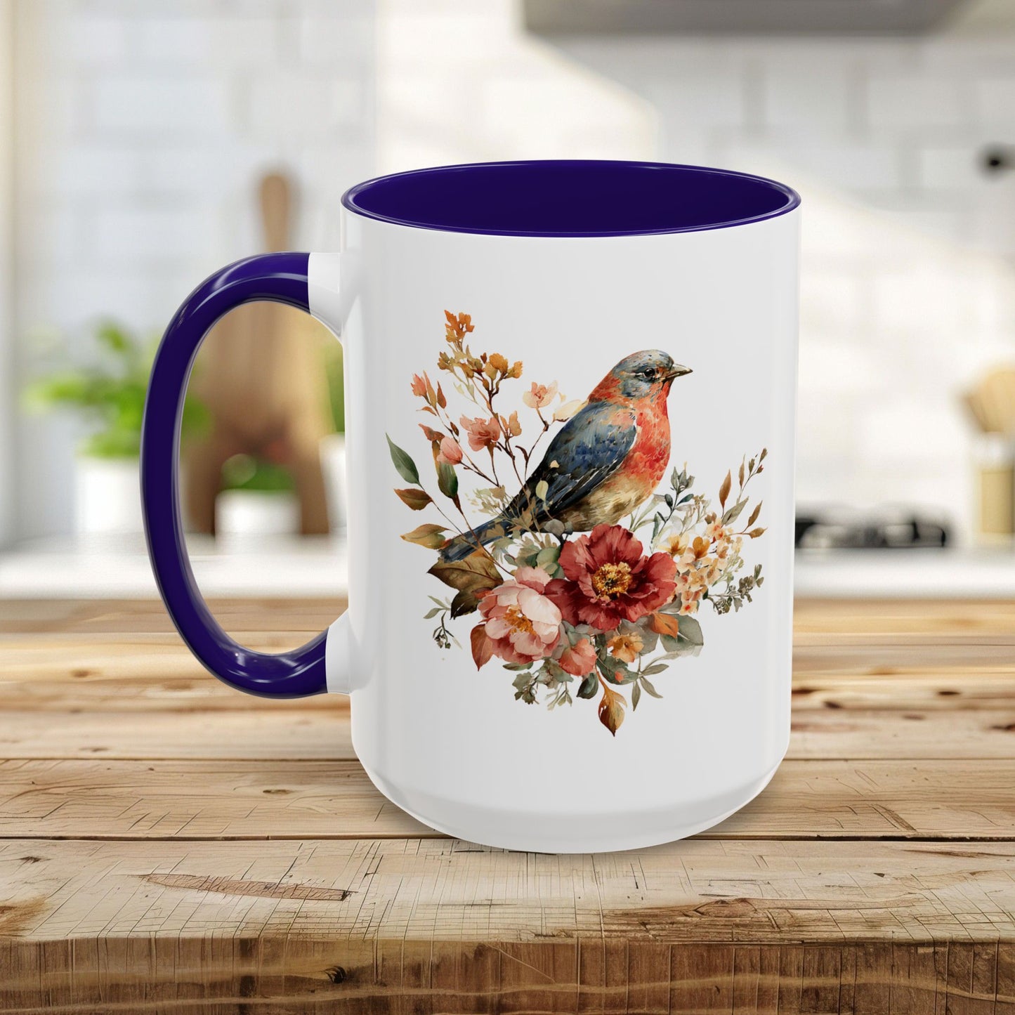 White ceramic mug with a bluebird and peony watercolor print, featuring a vivid purple interior and handle.