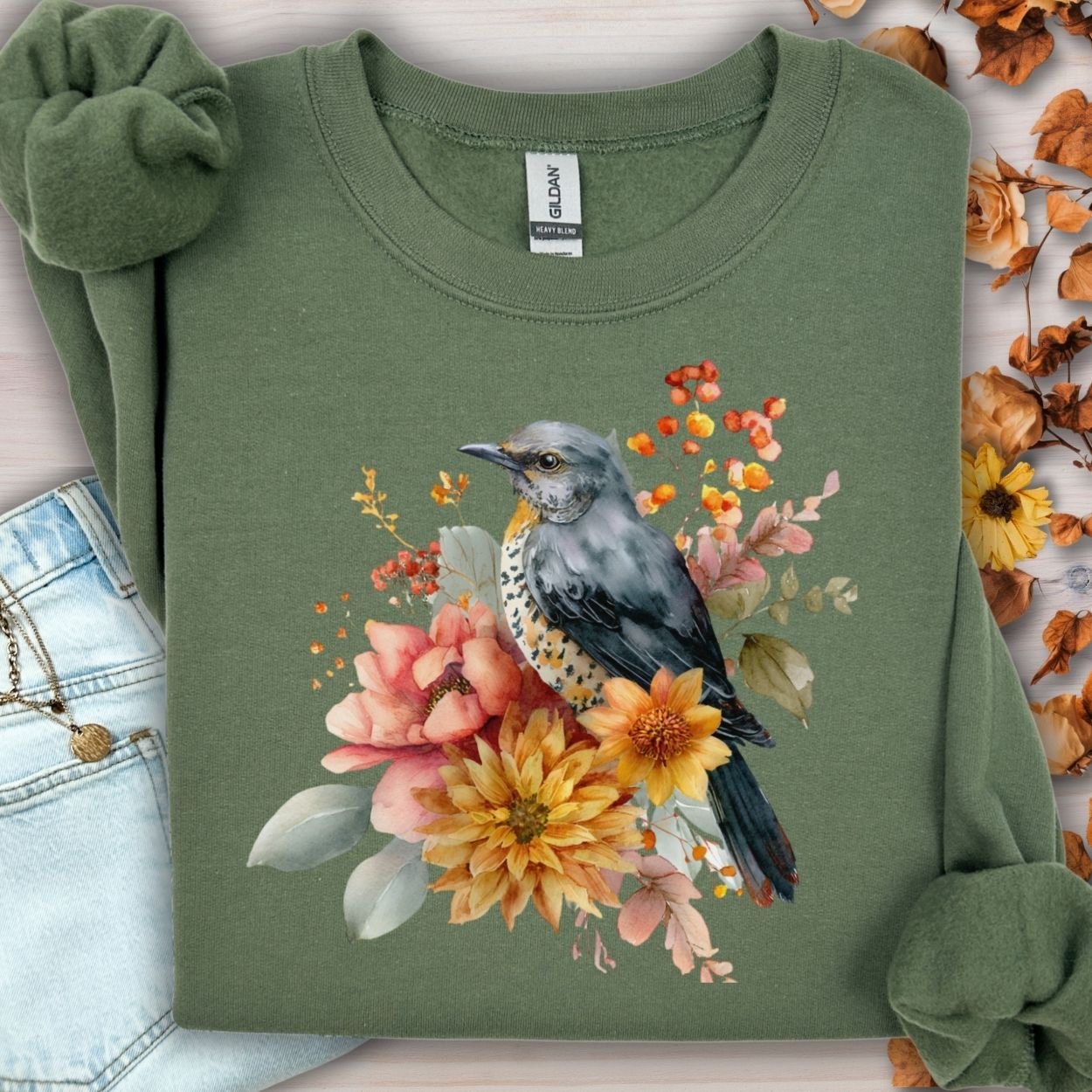 Military Green crewneck sweatshirt with a painterly bluebird and autumn floral design.