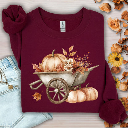 Maroon Gildan sweatshirt with a boho wagon, pumpkins, and autumn flowers design.