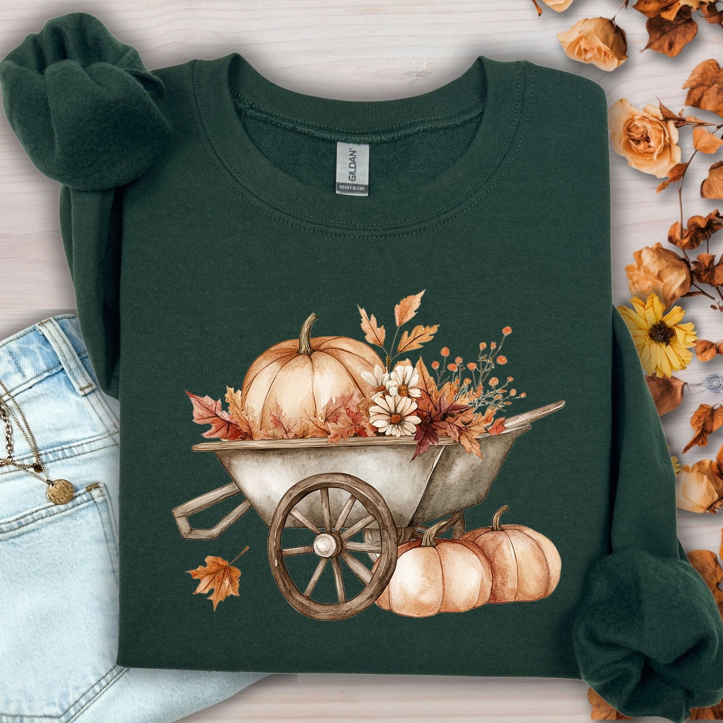 Forest Green Gildan sweatshirt with a boho wagon, pumpkins, and autumn flowers.
