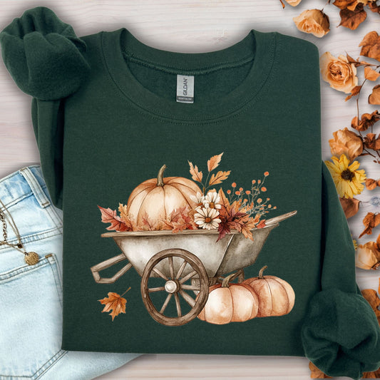 Forest Green Gildan sweatshirt with a boho wagon, pumpkins, and autumn flowers.