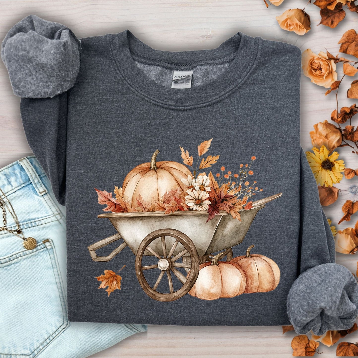 Dark Heather Gildan sweatshirt with a boho wagon, pumpkins, and autumn flowers.
