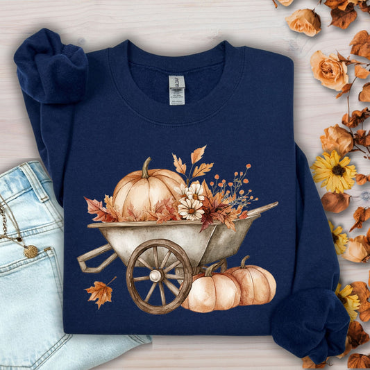 Navy Gildan cotton-poly sweatshirt with a boho wagon, pumpkins, and autumn flowers design.