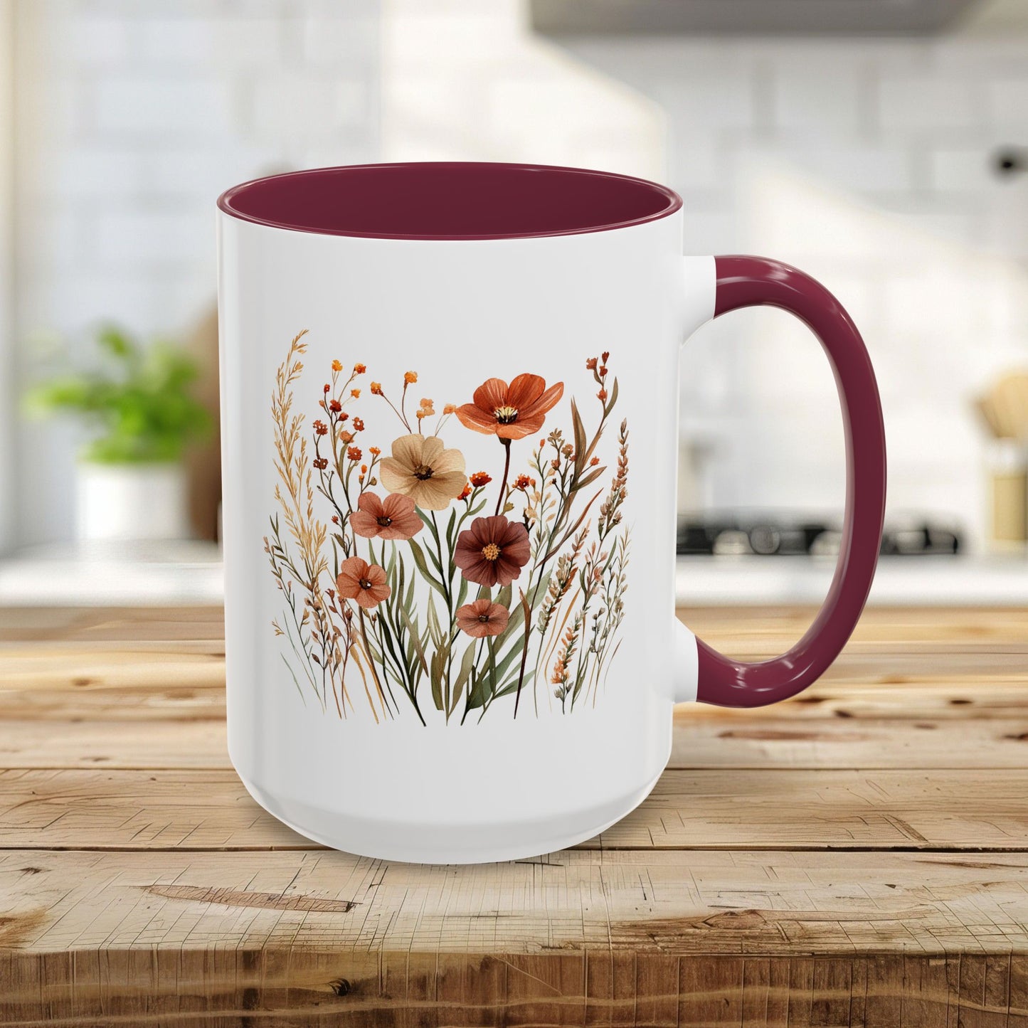 15oz white ceramic mug with maroon handle and interior, featuring autumn wildflower watercolor art.