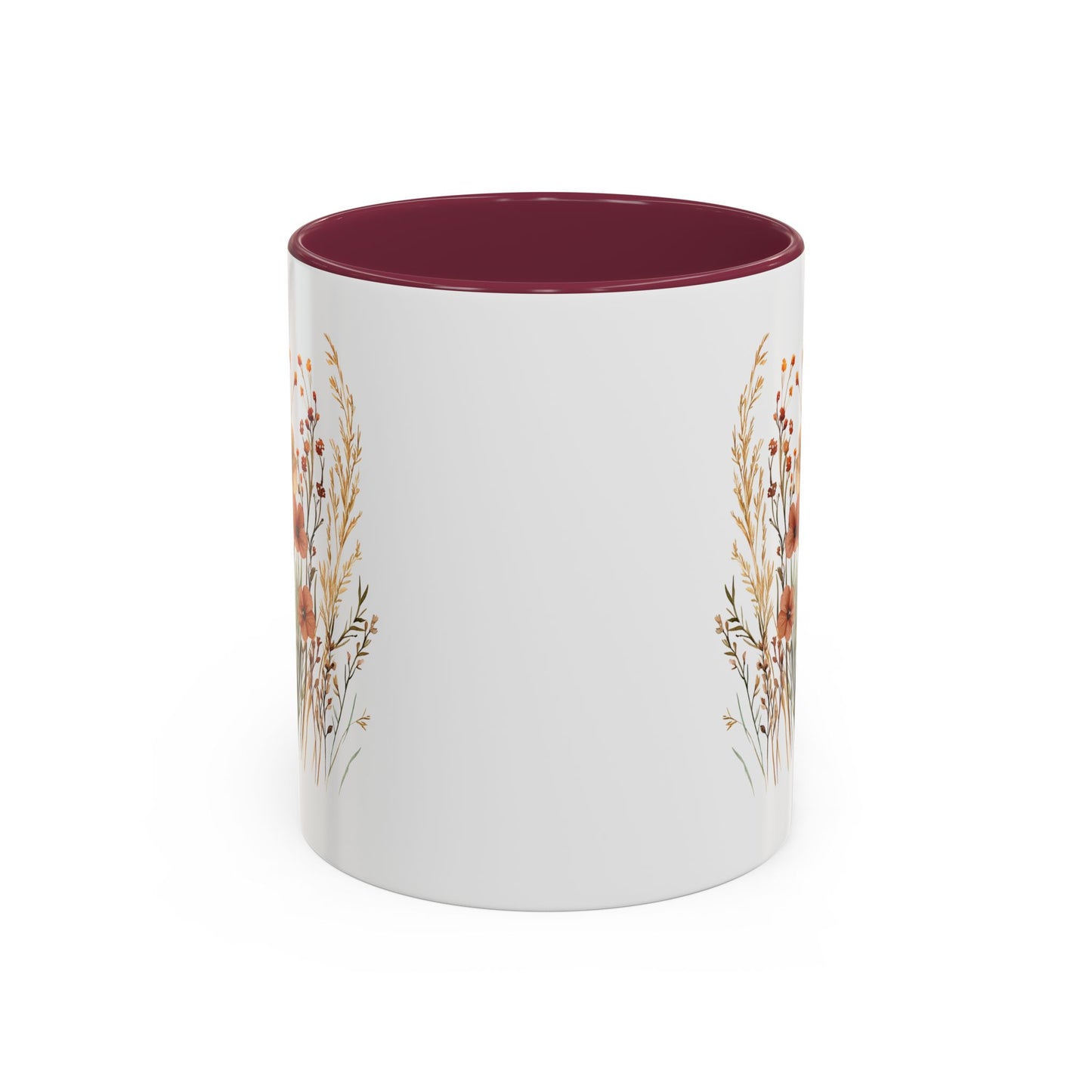 White ceramic mug with a deep red interior and handle, featuring watercolor autumn wildflowers.