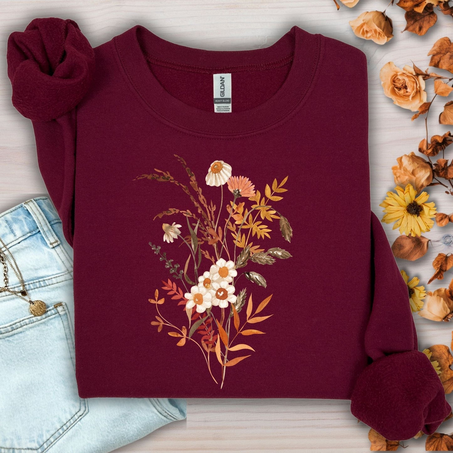 Maroon cotton-blend sweatshirt with a vintage autumn wildflower bouquet design.