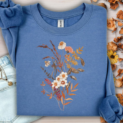 Indigo blue cotton-blend sweatshirt with a vintage autumn wildflower bouquet in warm beige and rust tones.