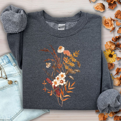 Dark heather gray cotton-blend sweatshirt with a vintage autumn wildflower bouquet in beige, rust, and warm tones.