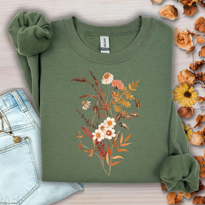 Military green sweatshirt with a vintage autumn wildflower bouquet in warm beige and rust tones.