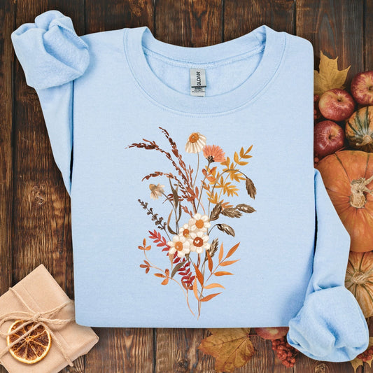 Light blue cotton-blend sweatshirt with a vintage autumn wildflower bouquet in warm beige and rust tones.