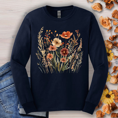 Navy long-sleeve cotton tee with watercolor autumn wildflowers in warm, earthy hues.