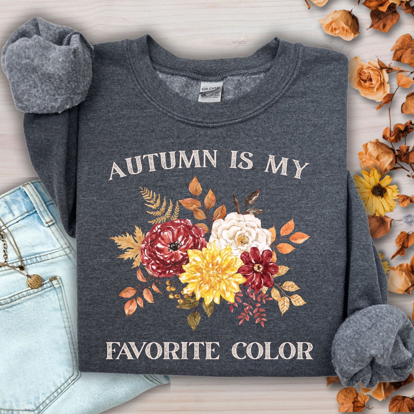 Dark Heather S sweatshirt with "Autumn is My Favorite Color" text and watercolor autumn flowers.