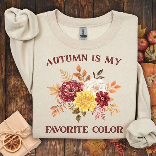 Sand 'Autumn is My Favorite Color' sweatshirt with watercolor autumn flowers, size S, on a wooden background.
