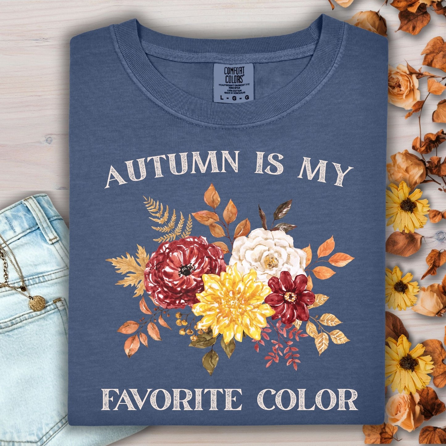 Denim Comfort Colors t-shirt with "Autumn Is My Favorite Color" and watercolor fall flowers.