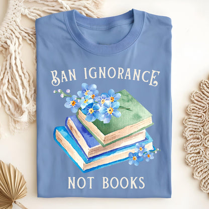 Carolina Blue "Ban Ignorance, Not Books" t-shirt with vintage books and watercolor forget-me-nots.