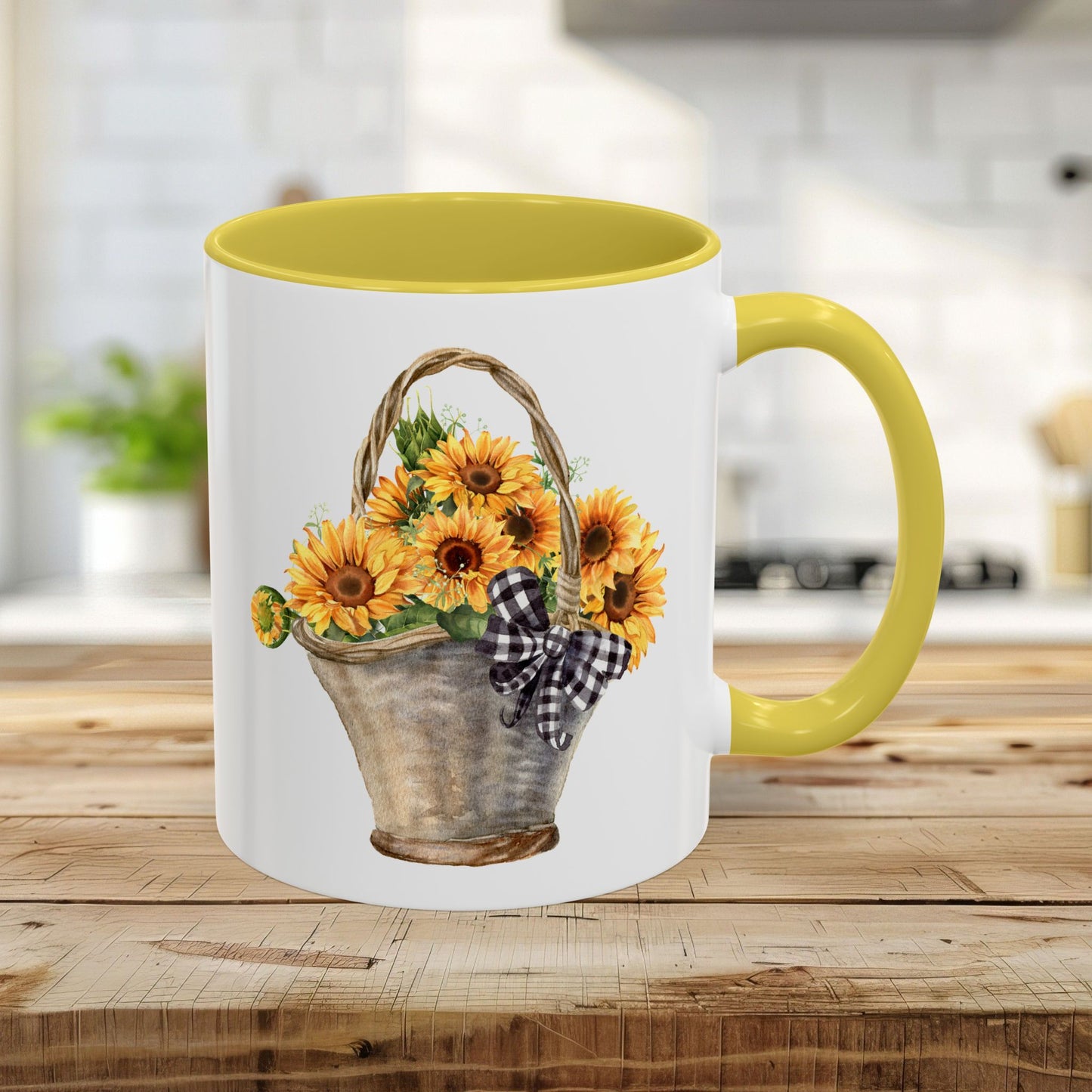 11oz ceramic mug with a yellow handle and interior, featuring a watercolor basket of sunflowers and a gingham bow.