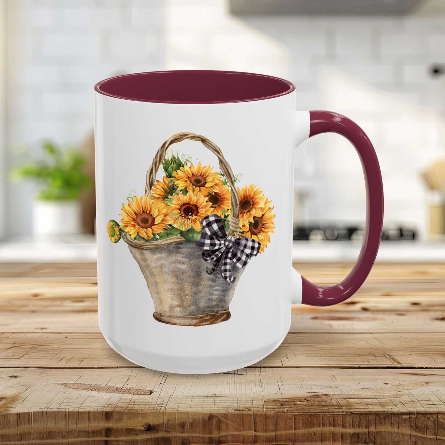 15oz white ceramic mug with maroon handle and interior, featuring a watercolor basket of sunflowers.