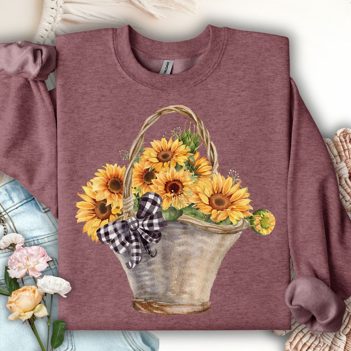 Heather Sport Dark Maroon sweatshirt with a watercolor basket of sunflowers and a black-and-white checkered bow.