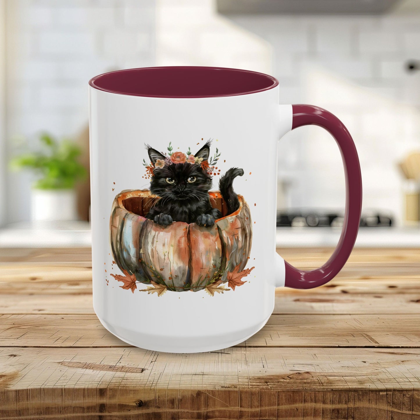 15oz white ceramic mug with maroon interior/handle, featuring a watercolor black kitten in a pumpkin.