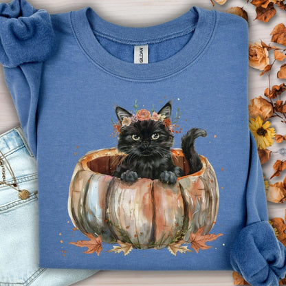 Indigo Blue Gildan sweatshirt with a watercolor black cat in a pumpkin and fall flowers.