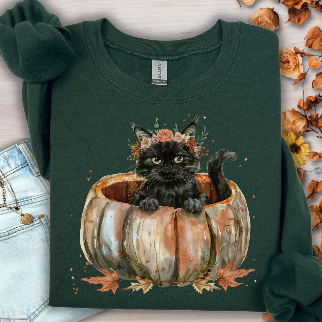 Forest Green Gildan sweatshirt with a black cat in a pumpkin surrounded by autumn flowers.