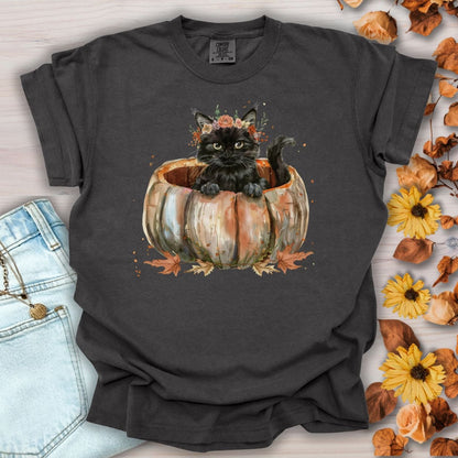 Pepper Comfort Colors t-shirt with a watercolor black cat in a pumpkin and autumn flowers.