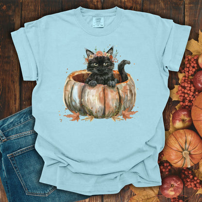 Chambray Comfort Colors t-shirt with a watercolor black cat in a pumpkin and autumn flowers.