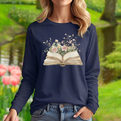 Navy long sleeve tee with a vintage book and blooming watercolor roses and wildflowers design.