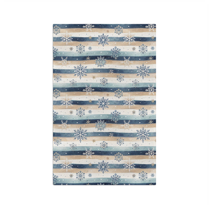Blue Boho Snowflake Stripe Microfiber Tea Towel with muted navy, cream, and beige stripes and scattered snowflakes.