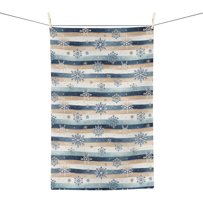 Blue boho snowflake stripe microfiber tea towel with muted navy, cream, and warm beige stripes.