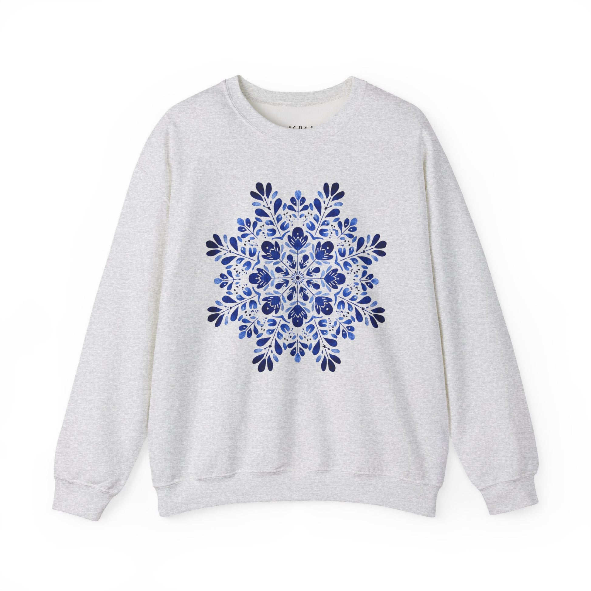 White crewneck sweatshirt with a large, symmetrical blue floral medallion design.