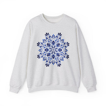 White crewneck sweatshirt with a large, symmetrical blue floral medallion design.