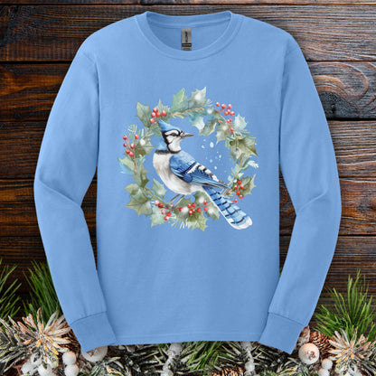 Carolina Blue long sleeve tee with a watercolor blue jay in a holly wreath design.
