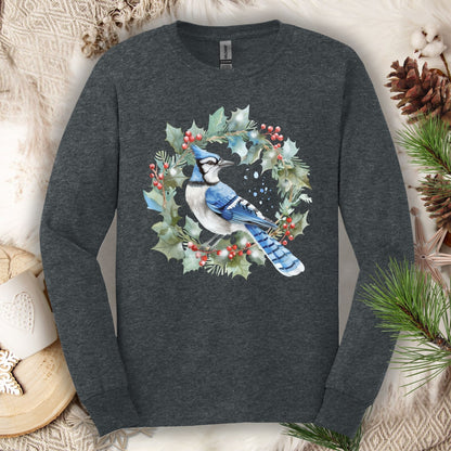 Dark Heather long sleeve tee with a watercolor blue jay in a holly wreath design.
