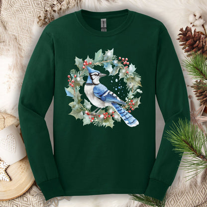 Forest Green long sleeve tee with a watercolor blue jay in a holly wreath design.