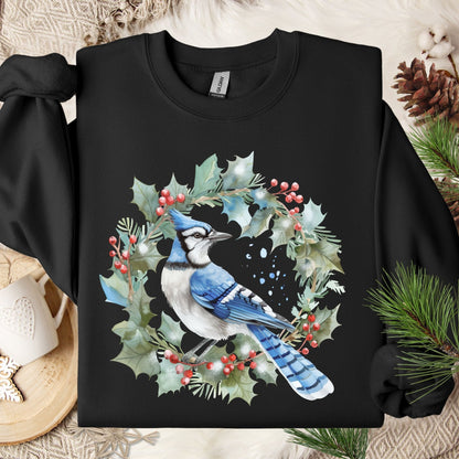 Black Gildan 18000 sweatshirt with a blue jay in a holly wreath watercolor design.