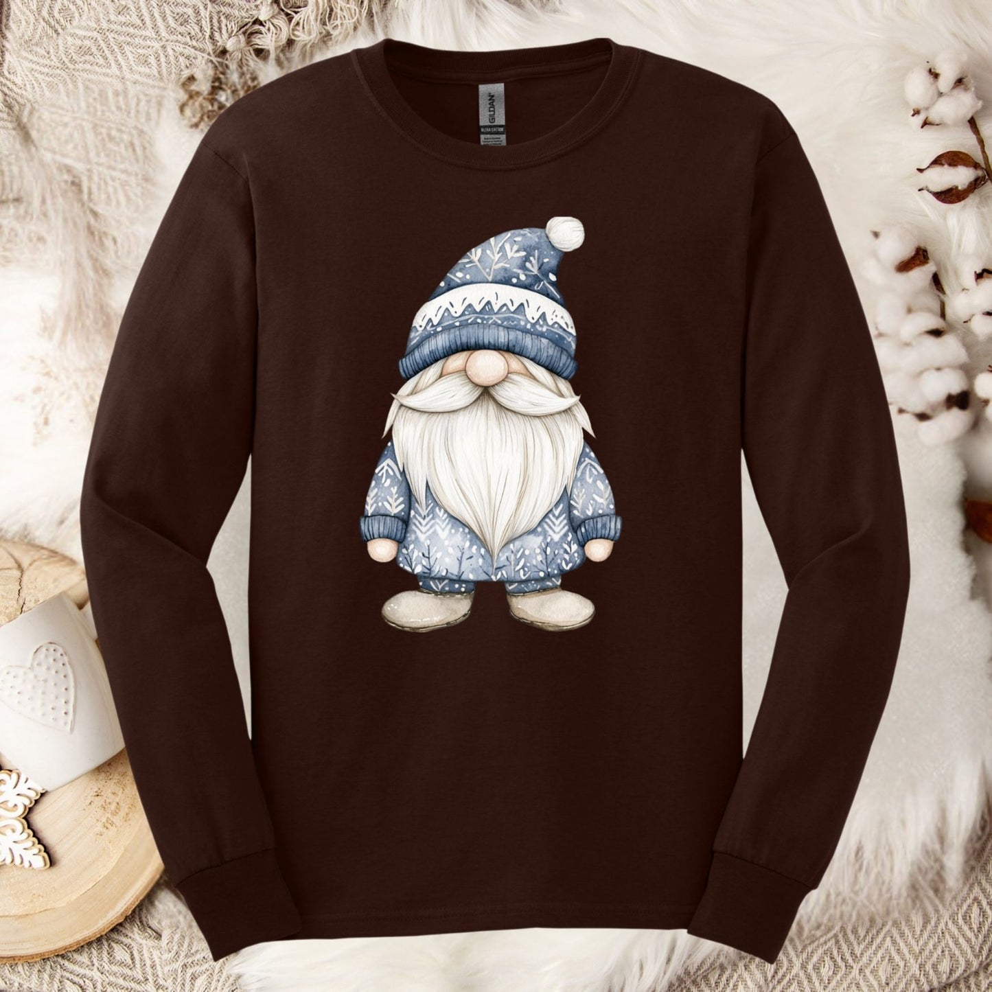 Dark chocolate long sleeve tee with a hand-illustrated blue Nordic gnome design.