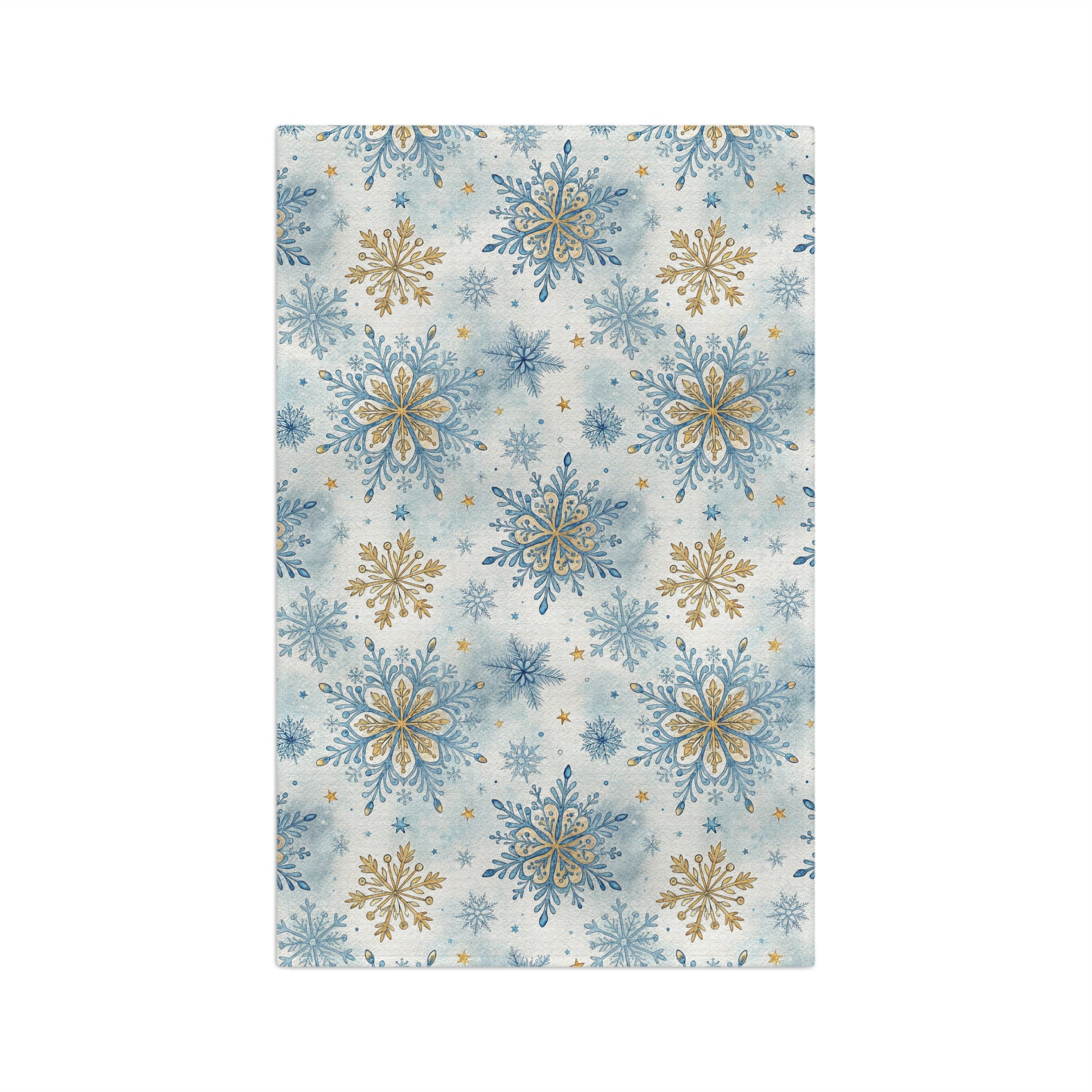 Blue and gold snowflake pattern microfiber tea towel with watercolor background, 16x25 inches.