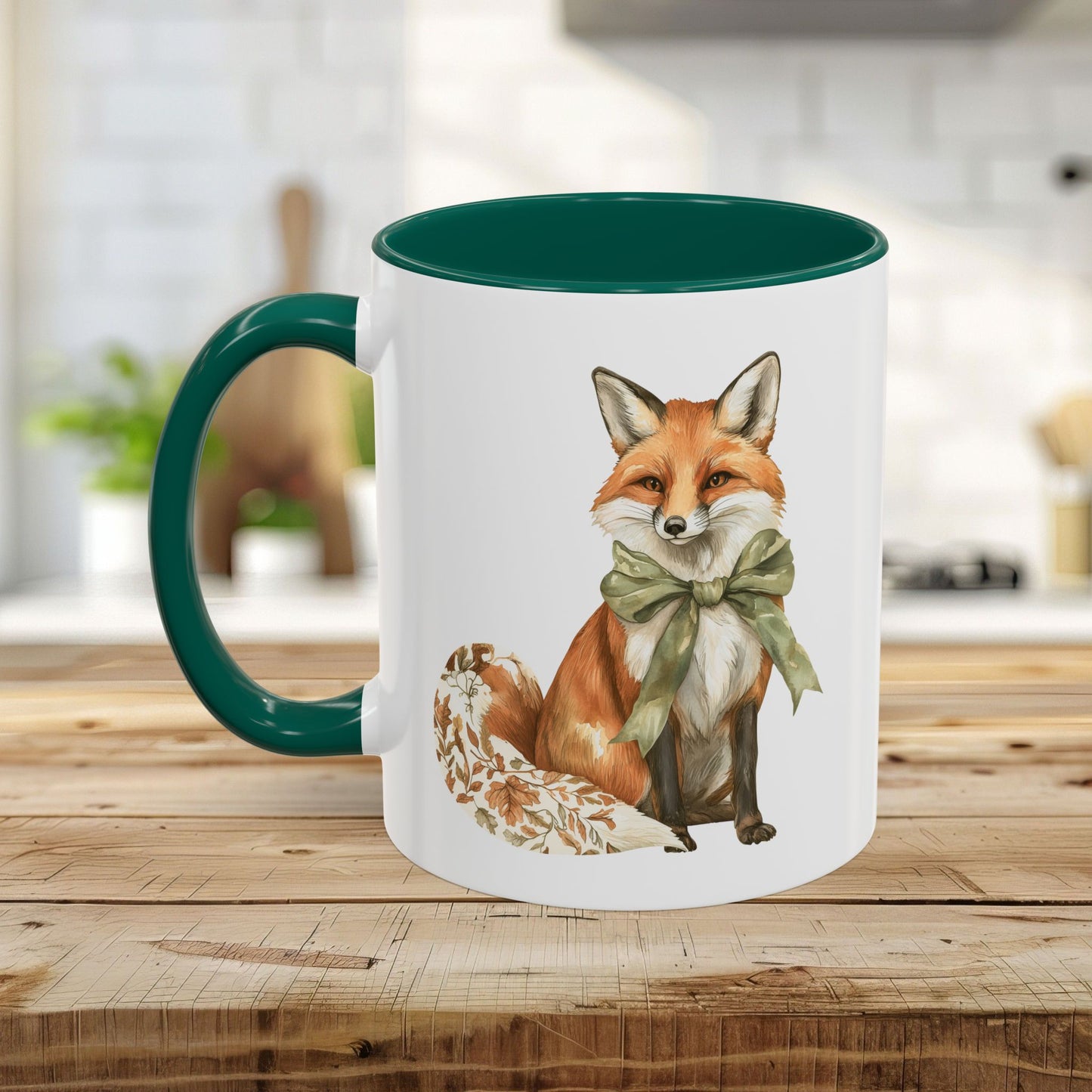 Boho autumn fox watercolor mug with a green bow, matching green handle and interior, on a wooden surface.