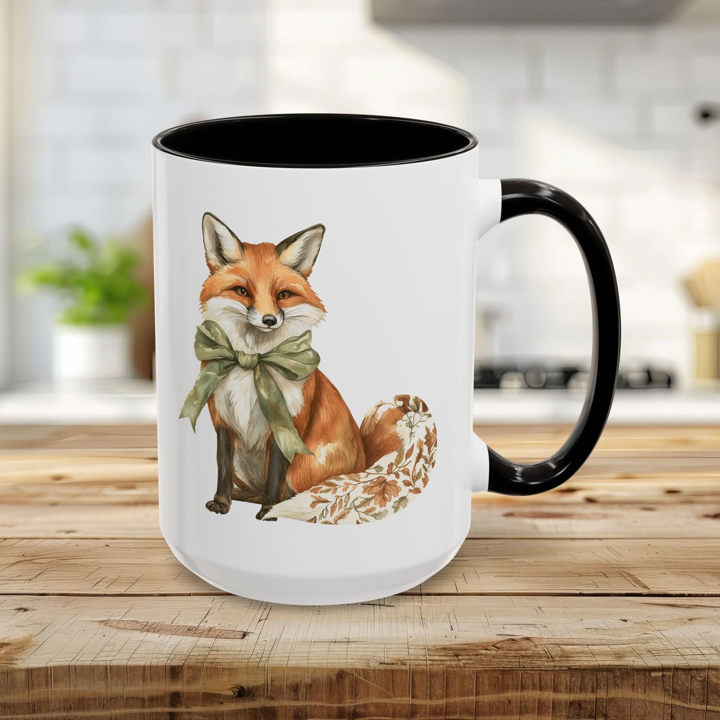 15oz white ceramic mug with a watercolor fox wearing a green bow, black handle, and interior.