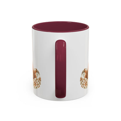 White ceramic mug with a maroon handle and interior, featuring a partial watercolor fox design.
